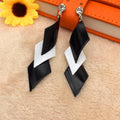 Black And White Lacquered Leaf Rhombus Curved Triangle Earrings