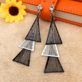 Black And White Lacquered Leaf Rhombus Curved Triangle Earrings