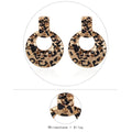 Metal leopard earrings with diamond hoop