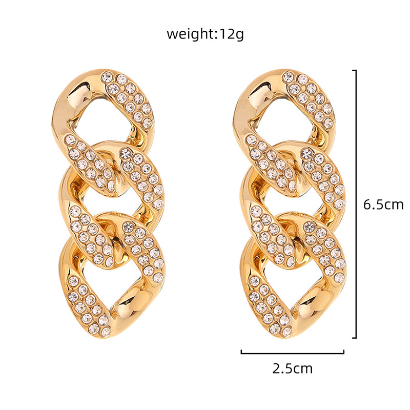 Exaggerated studs with short chains and diamond studs