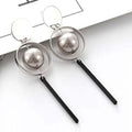 Hollow ring pearl earrings