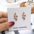 Little snake girl temperament earrings