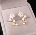 C586 Korean edition ornaments shell flower pearl earnail female fashion silver leaf branch earrings wholesale