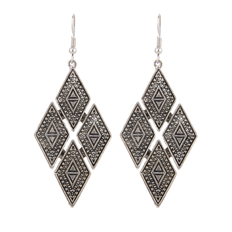 Exaggerated geometric diamond carved earrings