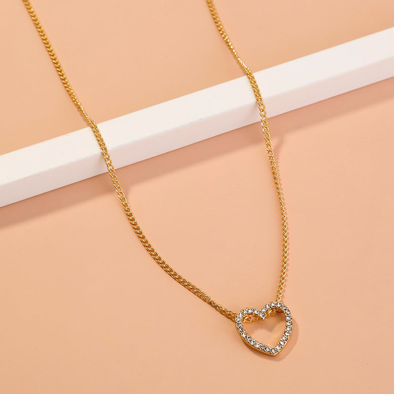 A Diamond Necklace With A Hollow Heart