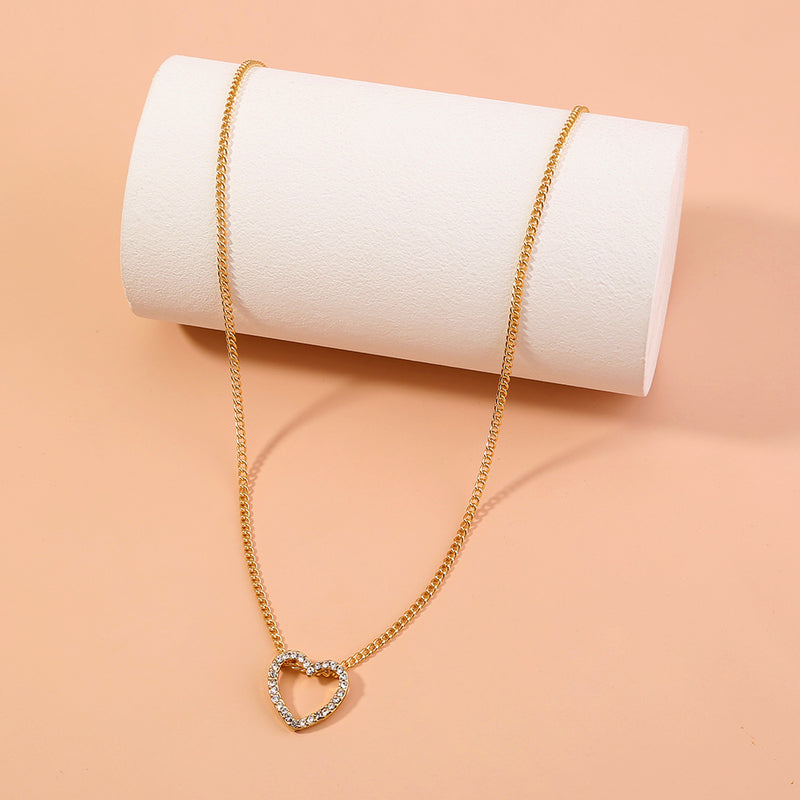 A Diamond Necklace With A Hollow Heart
