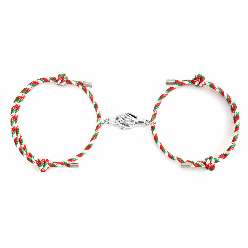 Holding Magnets To Attract Christmas Couple Bracelets