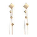 Long fringe exaggerated earrings