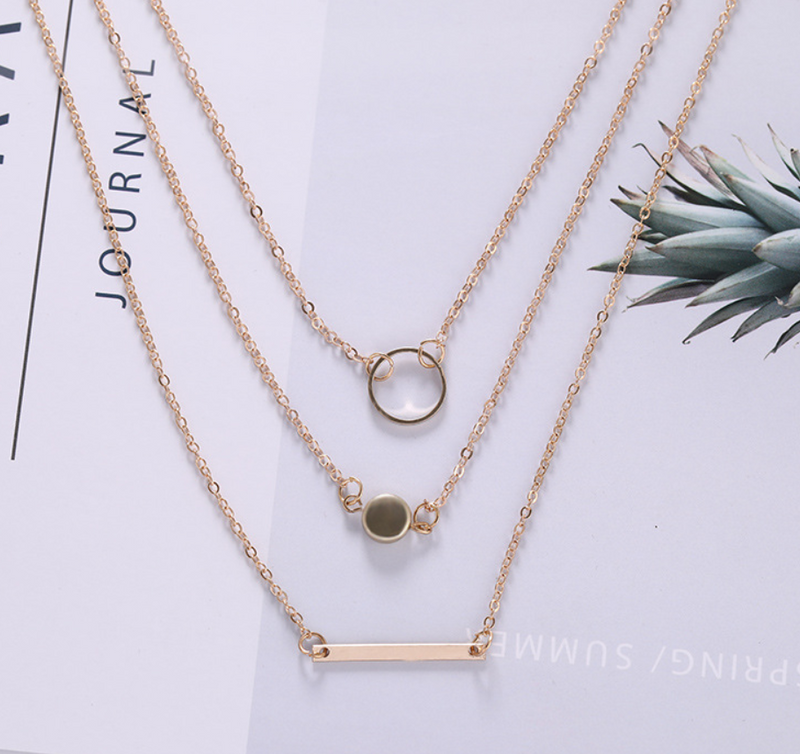 Aperture metal rod necklace