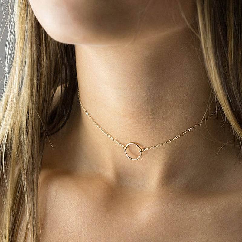 Delicate brass ring necklace