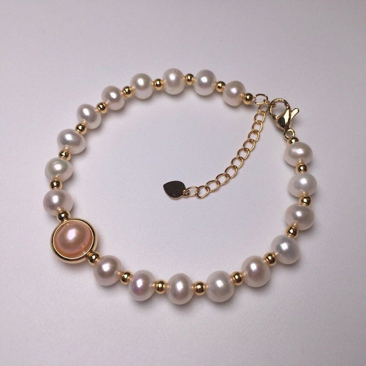 Elegant Pearl Bracelet With Transfer Bead Design