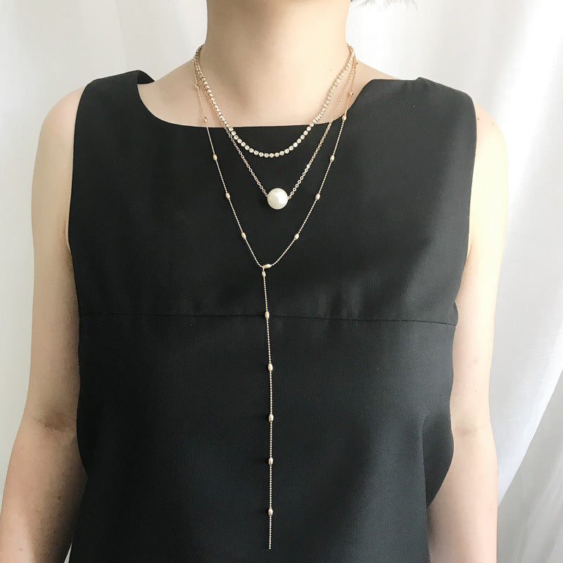 Europe and the United States new clavicle neck chain women's suit claw chain crystal pendant three-layer pearl necklace women's jewelry wholesale