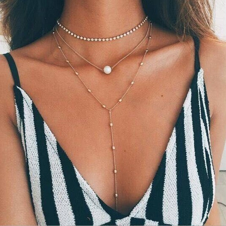 Europe and the United States new clavicle neck chain women's suit claw chain crystal pendant three-layer pearl necklace women's jewelry wholesale