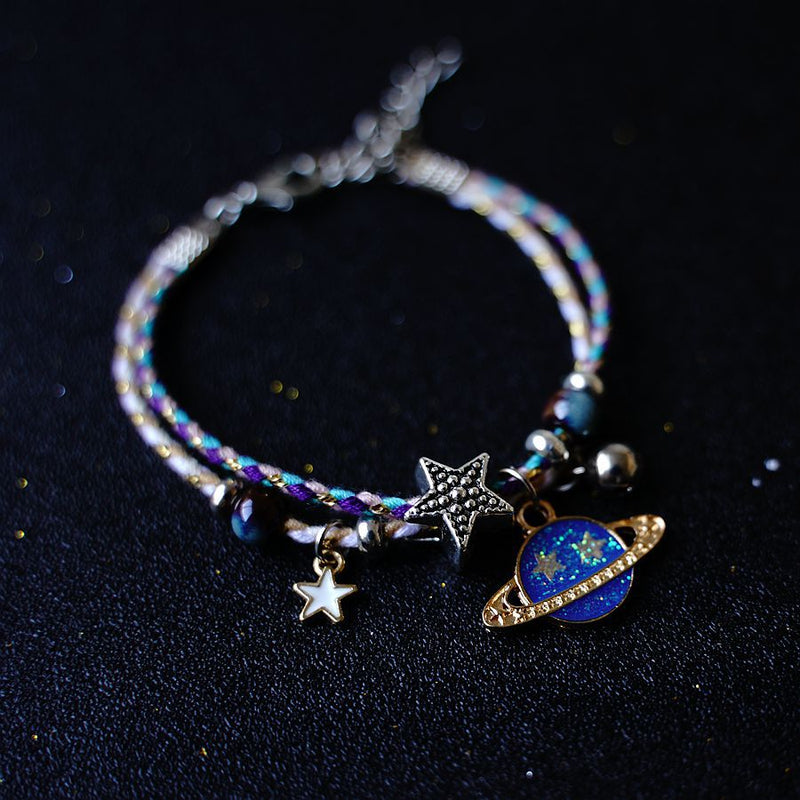 A Pair Of Women's Star And Moon Bracelets