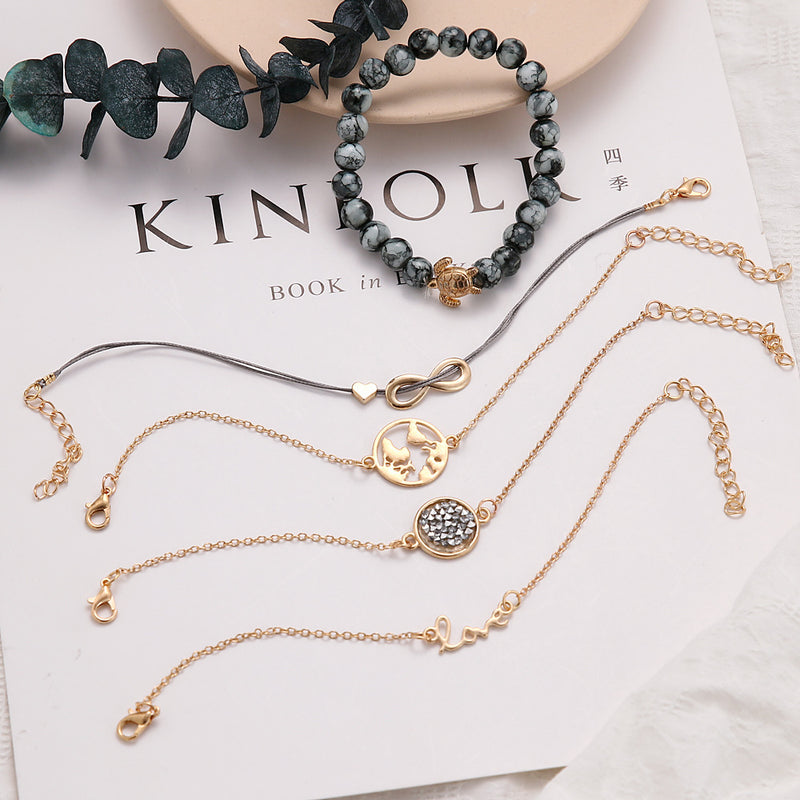 Five-Piece Trendy Tortoise, World Map, Peach & Heart Bracelet Set