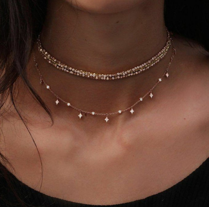 Multi-layered diamond star pendant necklace