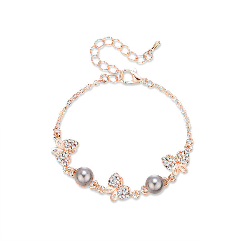 Alloy Bracelet With Rhinestones And Pearl Points