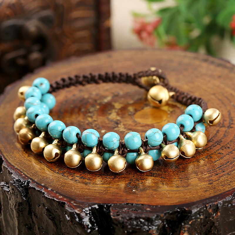 Turquoise braided bell bracelet