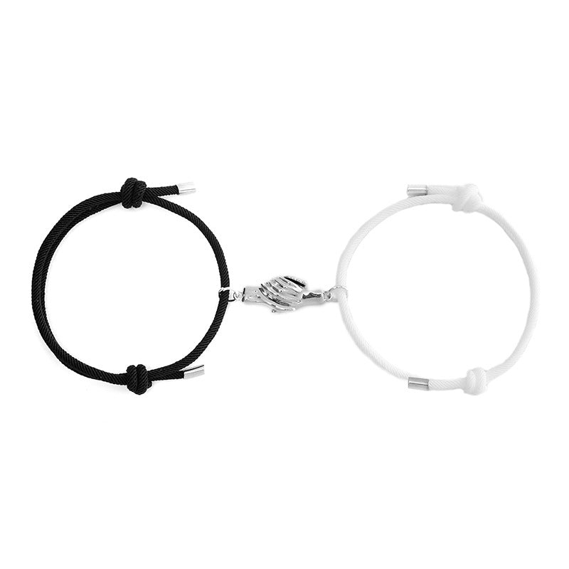 Holding Magnets To Attract Christmas Couple Bracelets