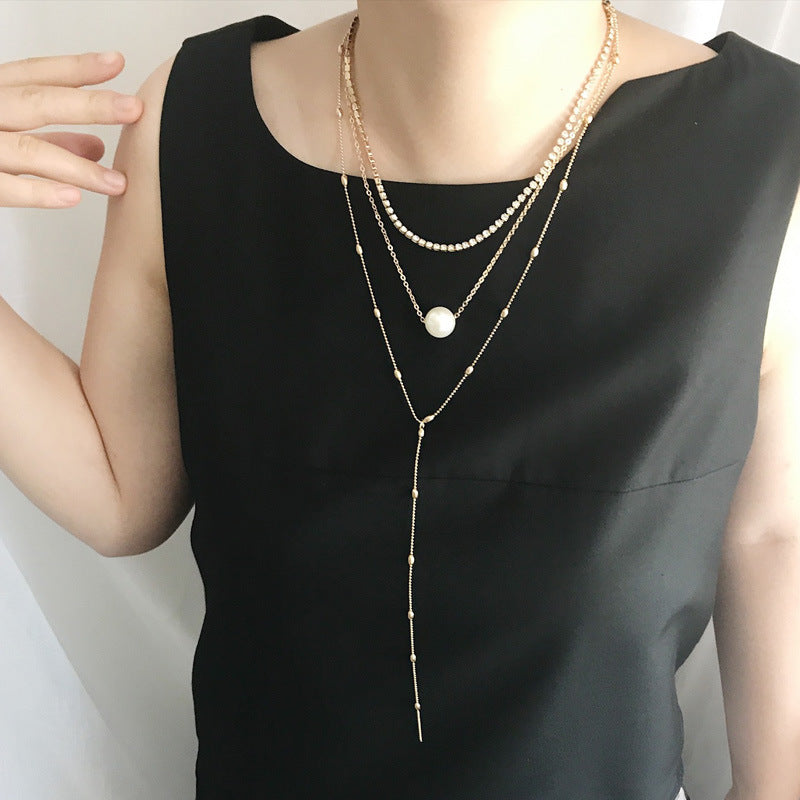 Europe and the United States new clavicle neck chain women's suit claw chain crystal pendant three-layer pearl necklace women's jewelry wholesale