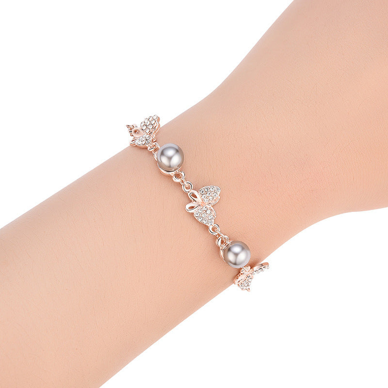 Alloy Bracelet With Rhinestones And Pearl Points