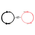 Holding Magnets To Attract Christmas Couple Bracelets