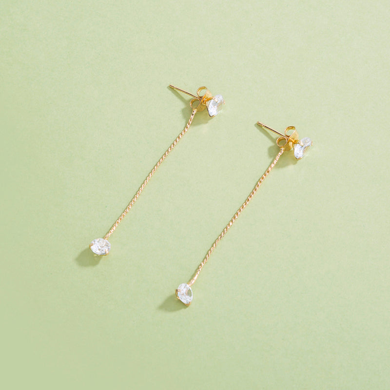 Simple gold with two elegant white zircon earrings