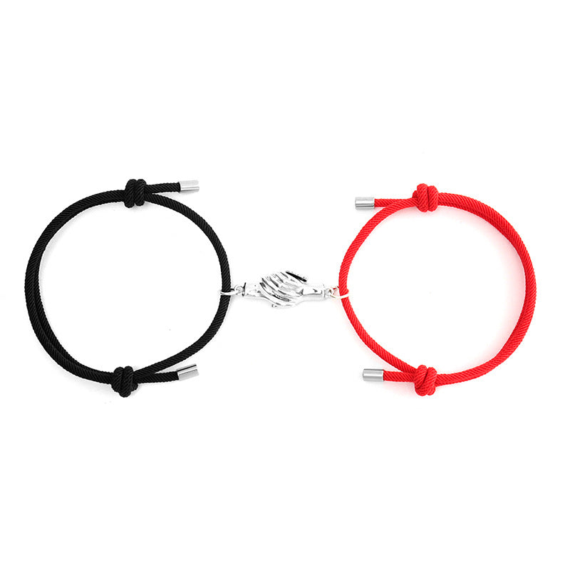Holding Magnets To Attract Christmas Couple Bracelets