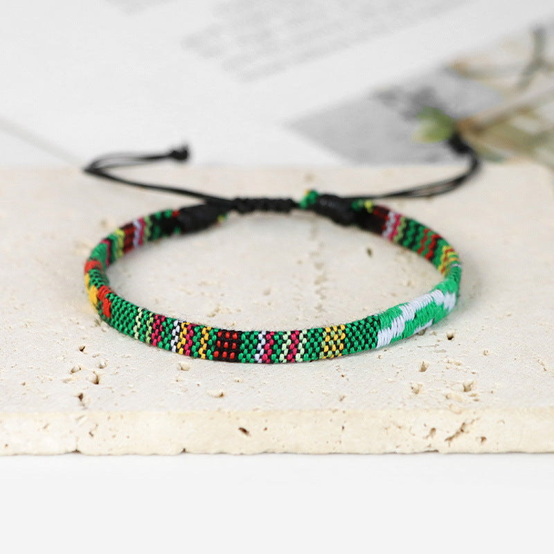 Braided bracelet in iridescent cotton ribbon