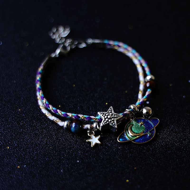 A Pair Of Women's Star And Moon Bracelets