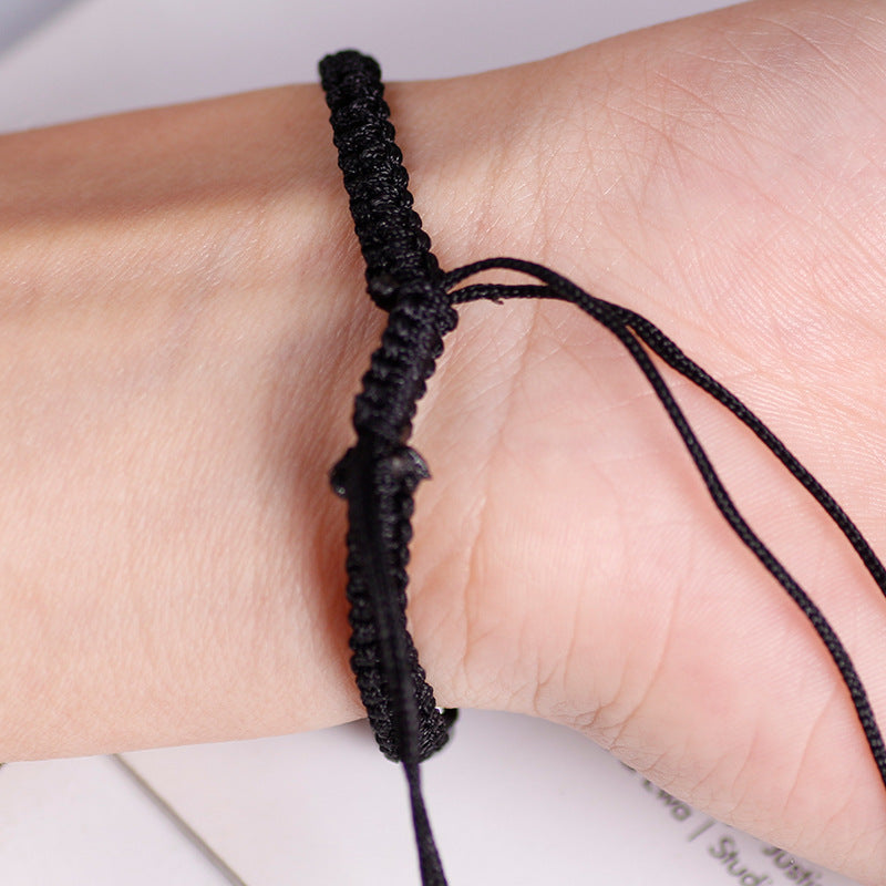 A Pair Of Braided Rope Bracelets